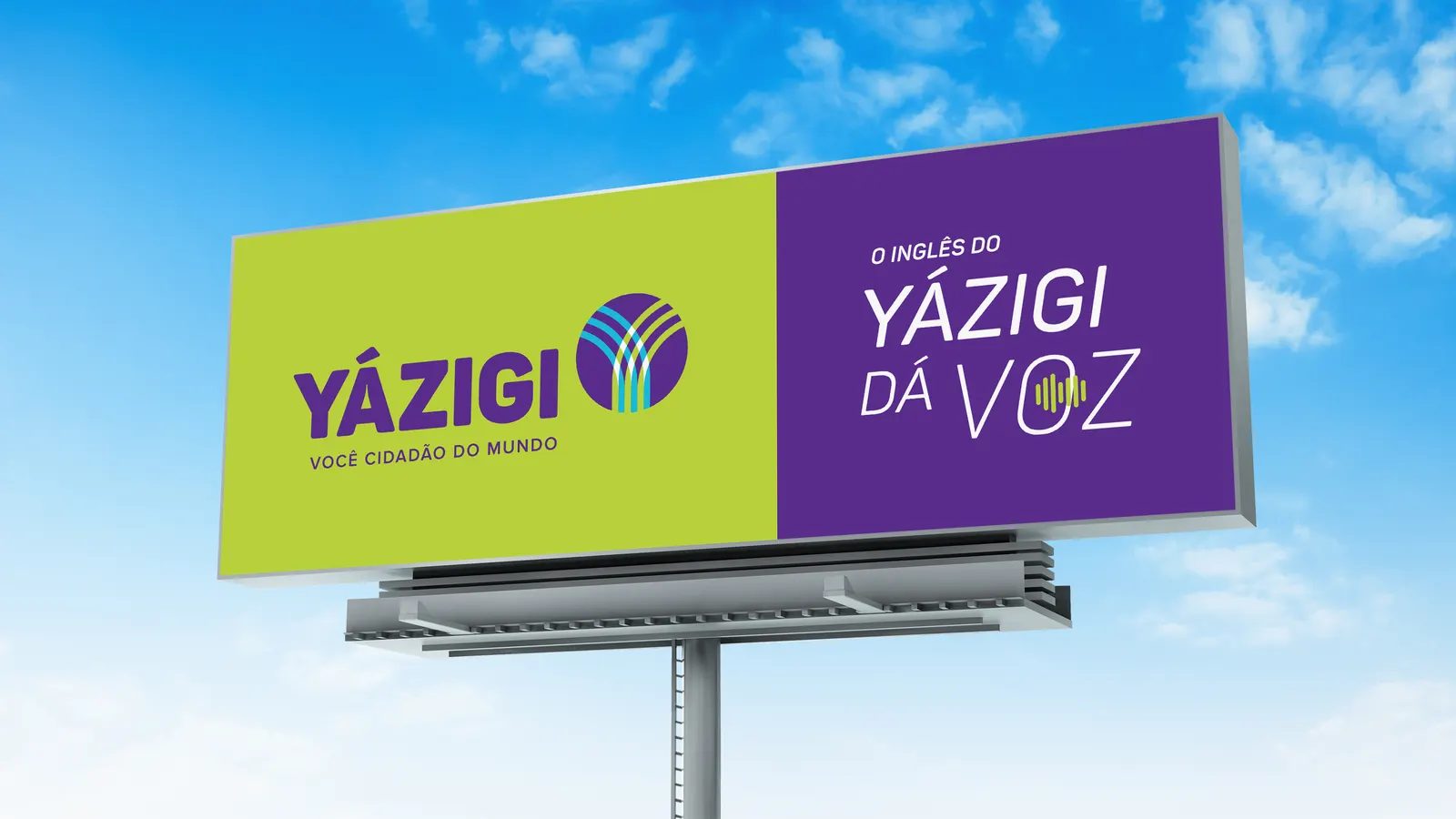 Imagem de um outdoor do Yázigi, destacando sua logo e identidade visual contra um céu azul ao fundo. A cena ilustra o estrangeirismo 'Outdoor'.